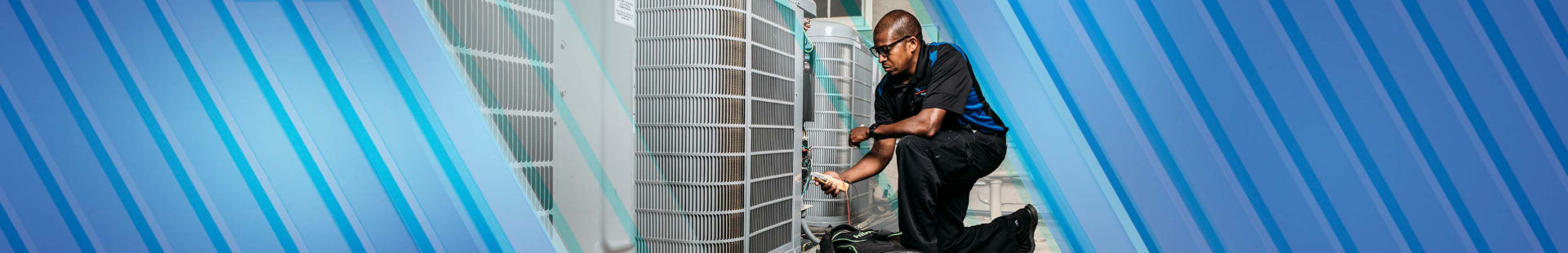 HVAC tech repairing an air conditioning unit
