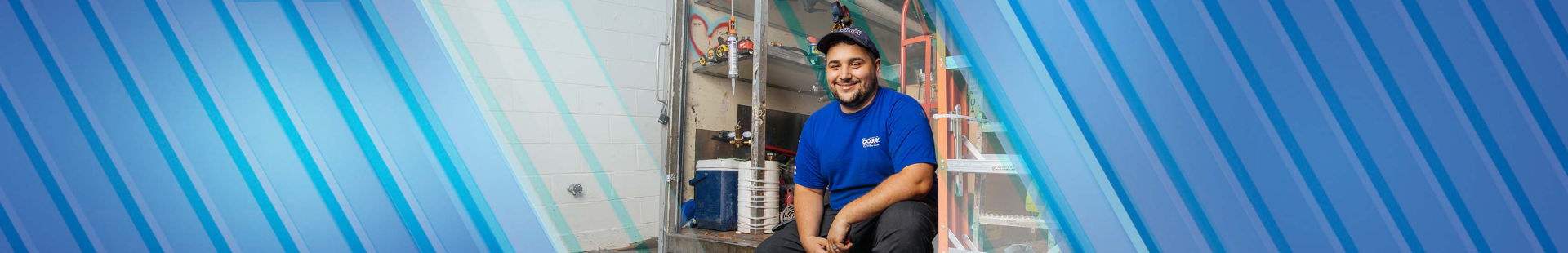 Smiling Coolray HVAC technician