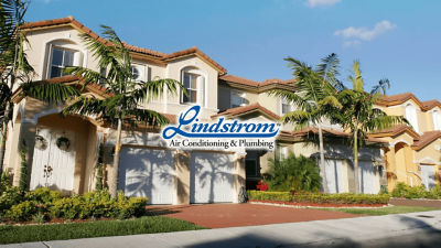 Lindstrom logo over townhomes in Florida