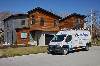 Mountain Home Services work van in front of a in Salt Lake City