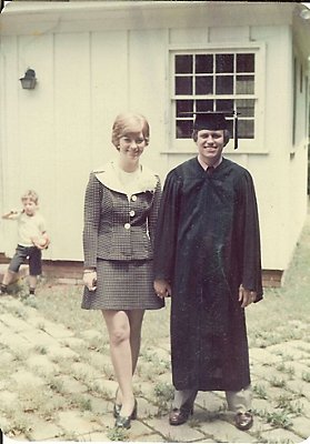 Vintage image of Mr. Jenkins in a grad suit at his college graduation