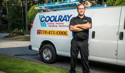 Atlanta AC Repair Technician Posing in Front of Coolray Truck