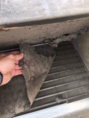 Dirty AC coils in a home air conditioning system