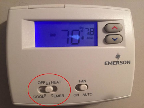 White Emerson Thermostat showing 70 degrees & 78 aux temp
