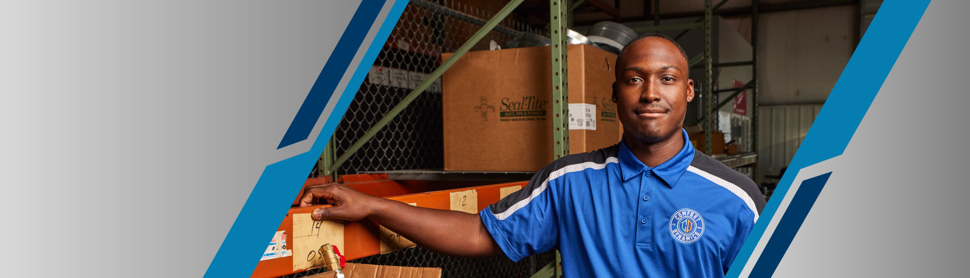 a person in a blue shirt in a warehouse