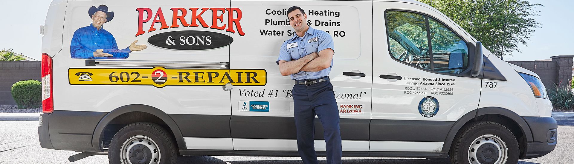 Technician repairing air conditioning unit