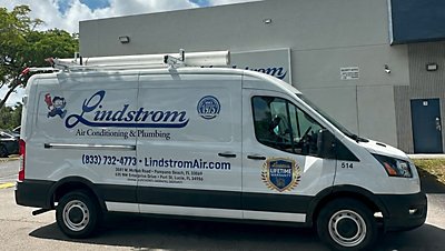 Lindstrom Van Parked Outside Office