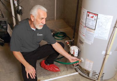 Water heater flush with plumber