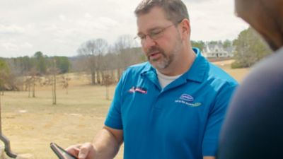 Ragsdale Technician Explaining Options Outdoors