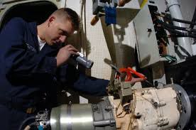 Man inspecting a generator