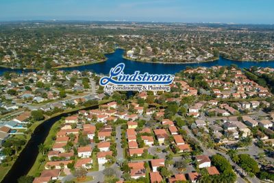 Port St. Lucie beachfront in blue tint with Lindstrom Logo 