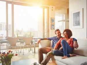 a couple sitting on a couch