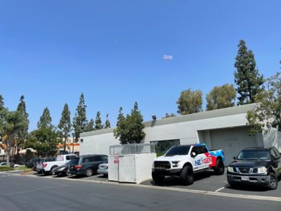 A Truck, A Banner, and A Plane