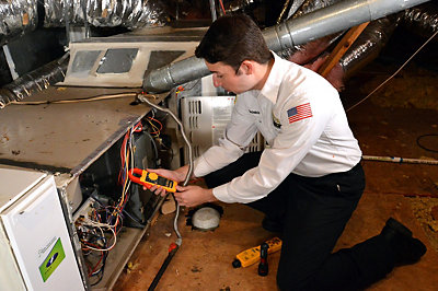 Abacus Technician Checking Furnace