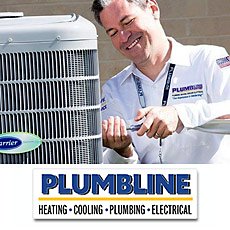 Tech repairing an air conditioner in Brighton, CO