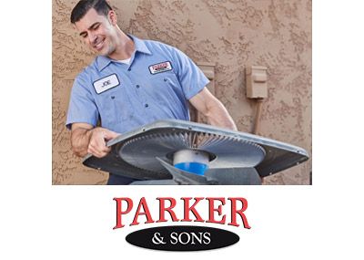 Technician performing an AC tune-up