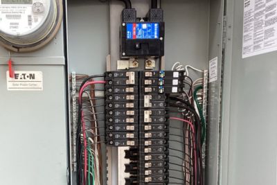close up of AFCI breakers on an electrical panel