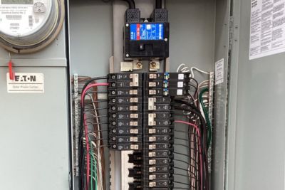 close up of AFCI breakers on an electrical panel