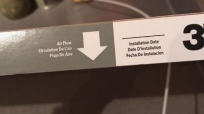 a sign with a white arrow