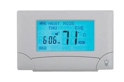 White digital thermostat with screen showing temperature