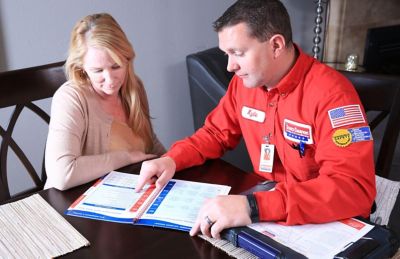 Service man talking with a woman