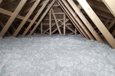 Home attic with fresh blown in insulation 
