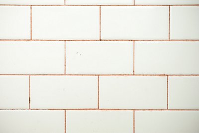 Pink residue in bathroom shower, caused by the bacteria Serratia marcescens
