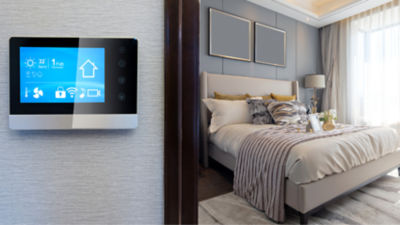 Digital thermostat ouside of nice master bedroom