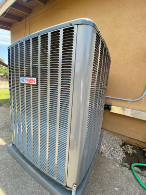 An AC unit connected to a building.