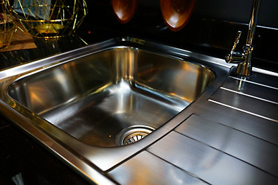 Brand new and shiny stainless steel kitchen sink