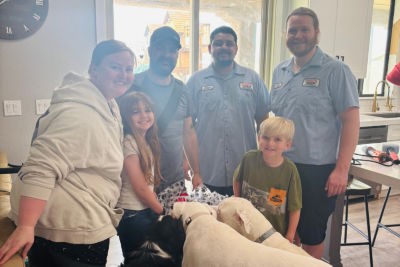 Burkhart family with technicians 