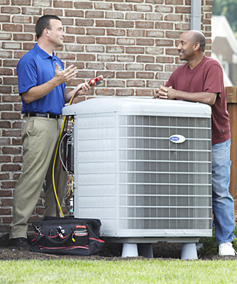 Two men discussing about buying a HVAC system