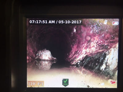 Camera footage of blockage in sewer line
