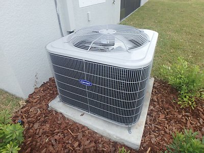 AC next to house in yard