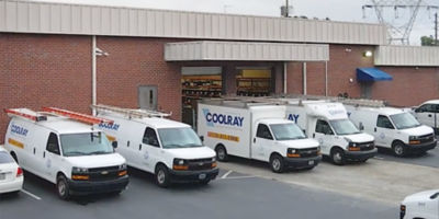 Coolray trucks backed into parking spots at headquarters