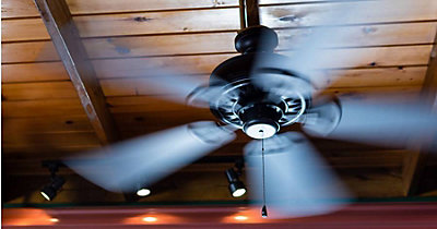 Close up of ceiling fan spinning