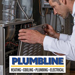 A Plumbline HVAC tech inspecting a furnace in a Centennial home