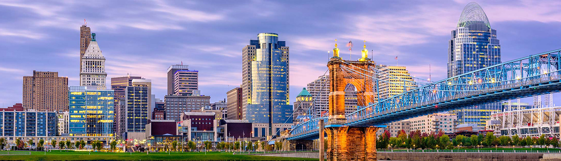 A Cincinnati skyline featuring a bridge over the river.