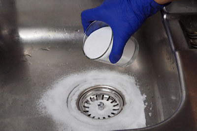 cleaning a home drain with baking soda
