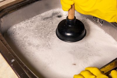 Plunging a clogged sink