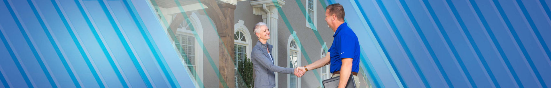 Woman and man shaking hands in front of home