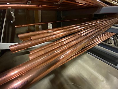A stack of copper pipes