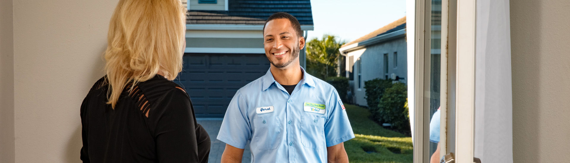 Cool Today technician being greeted by customer