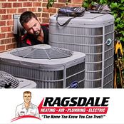 HVAC tech repairing an air conditioning system