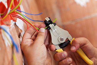 Electrician fixing wires
