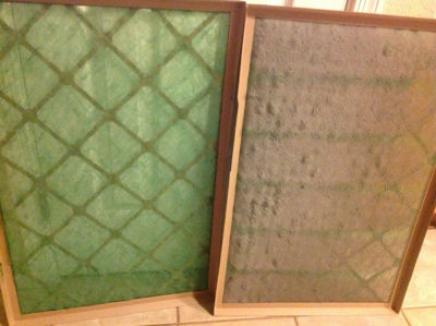 Dirty and  clean fiberglass air filter side by side