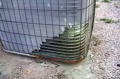 Outside air conditioning unit with dog urine damage