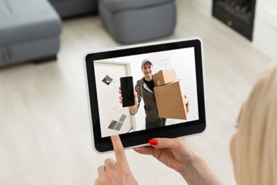 Tablet viewing doorbell security camera video