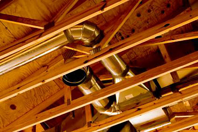 Air duct in ceiling of attic