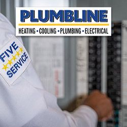 Plumbline electrician checking an electrical panel in a Frederick home